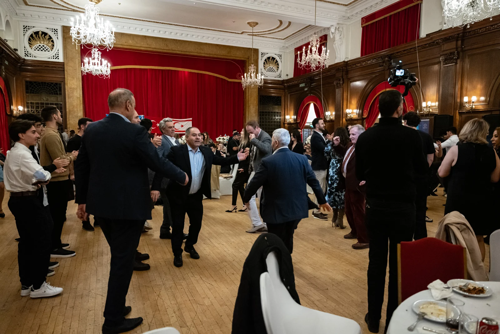Guests joining hands to dance at the 2025 BAA celebration